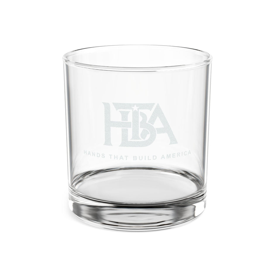 Clear 10.5 oz Whiskey Glass with the 'Hands That Build America' Logo engraved on one side (a white background)