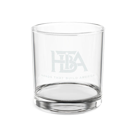 Clear 10.5 oz Whiskey Glass with the 'Hands That Build America' Logo engraved on one side (a white background)