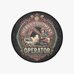 A circular graphic print or patch featuring a vintage-style illustration of a heavy equipment operator. The design shows a person in a hard hat operating an excavator on a construction site, with the words 'HEAVY EQUIPMENT OPERATOR' in bold lettering.