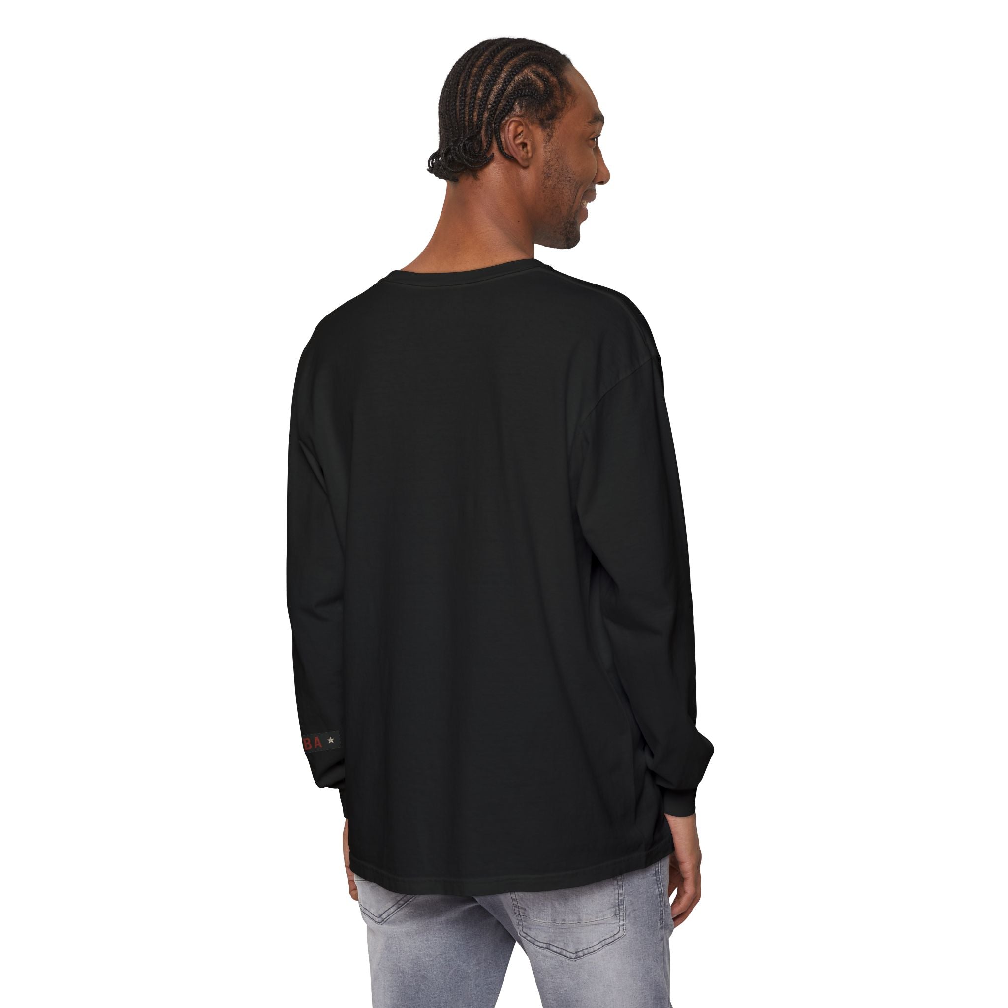 Person wearing a black long-sleeve shirt on a white background