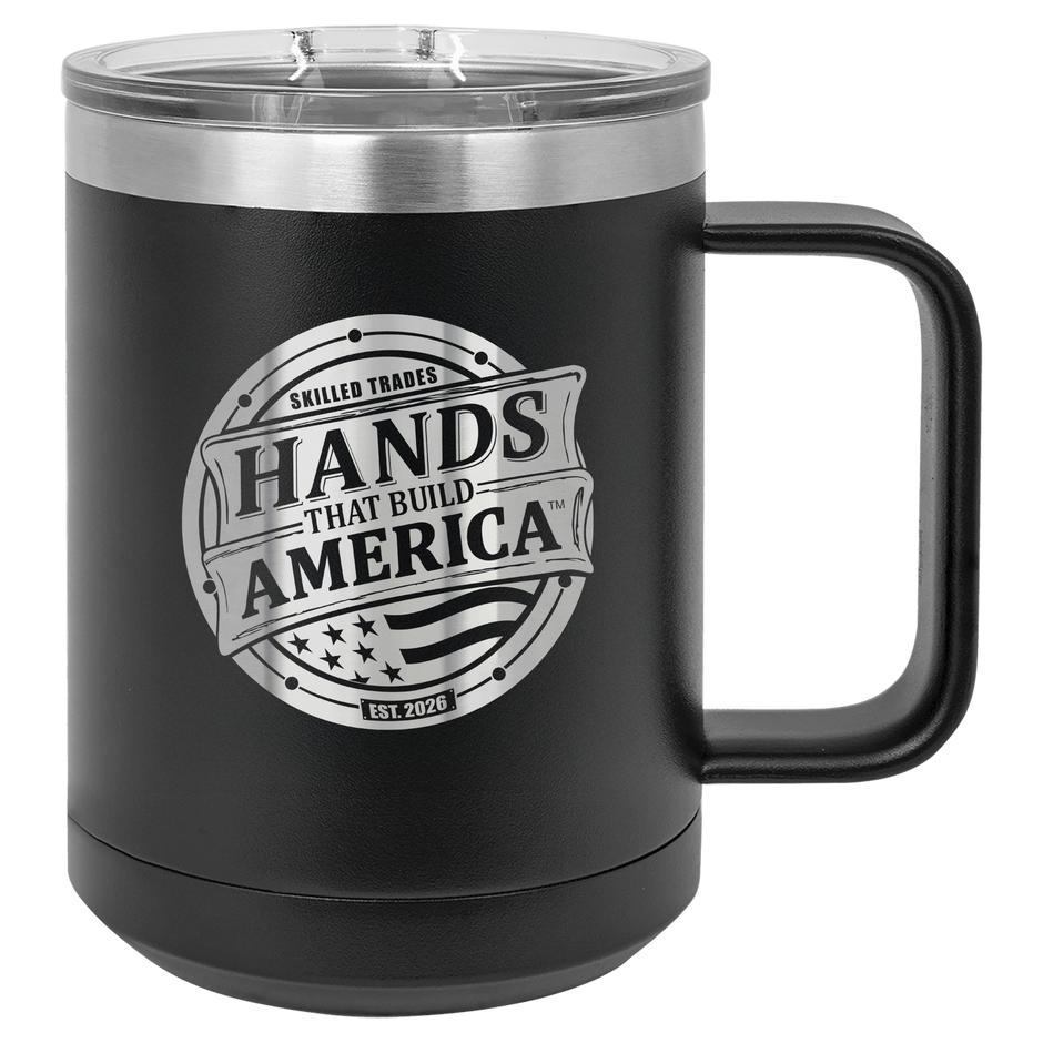 Black mug with 'Hands That Build America' logo on a checkered background