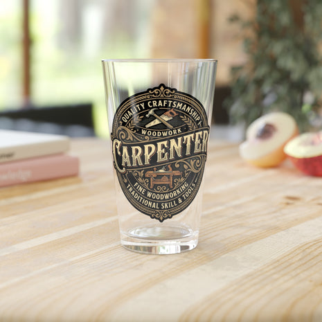 Clear 10oz pint glass with 'Carpenter' design on a wooden surface