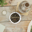 Wooden table setting with a 'Carpenter' logo bottle opener and opened bottle with cap off.