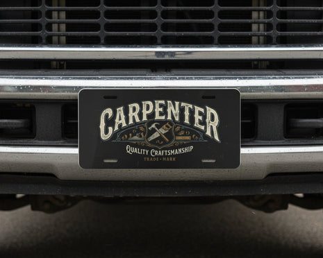 License plate with 'Carpenter' and 'Quality Craftsmanship' text on a work truck bumper