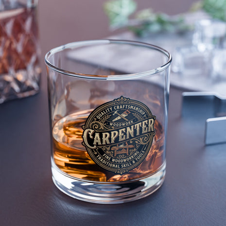 Glass of whiskey with a 'Carpenter' brand label on a dark surface