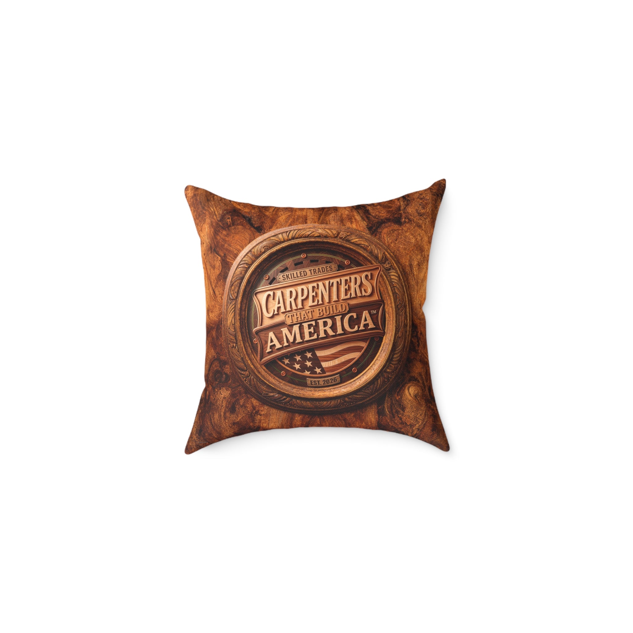 Brown pillow with 'Carpenters That Build America' logo on a white background
