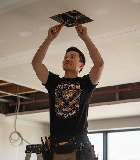 Black t-shirt with an eagle graphic and 'Electrician American Pride' text on a white background