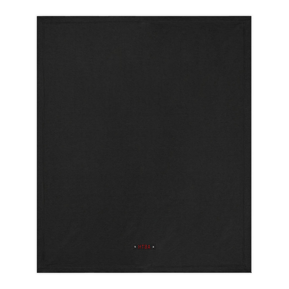 Black Throw Blanket with HTBA brand logo on a white background