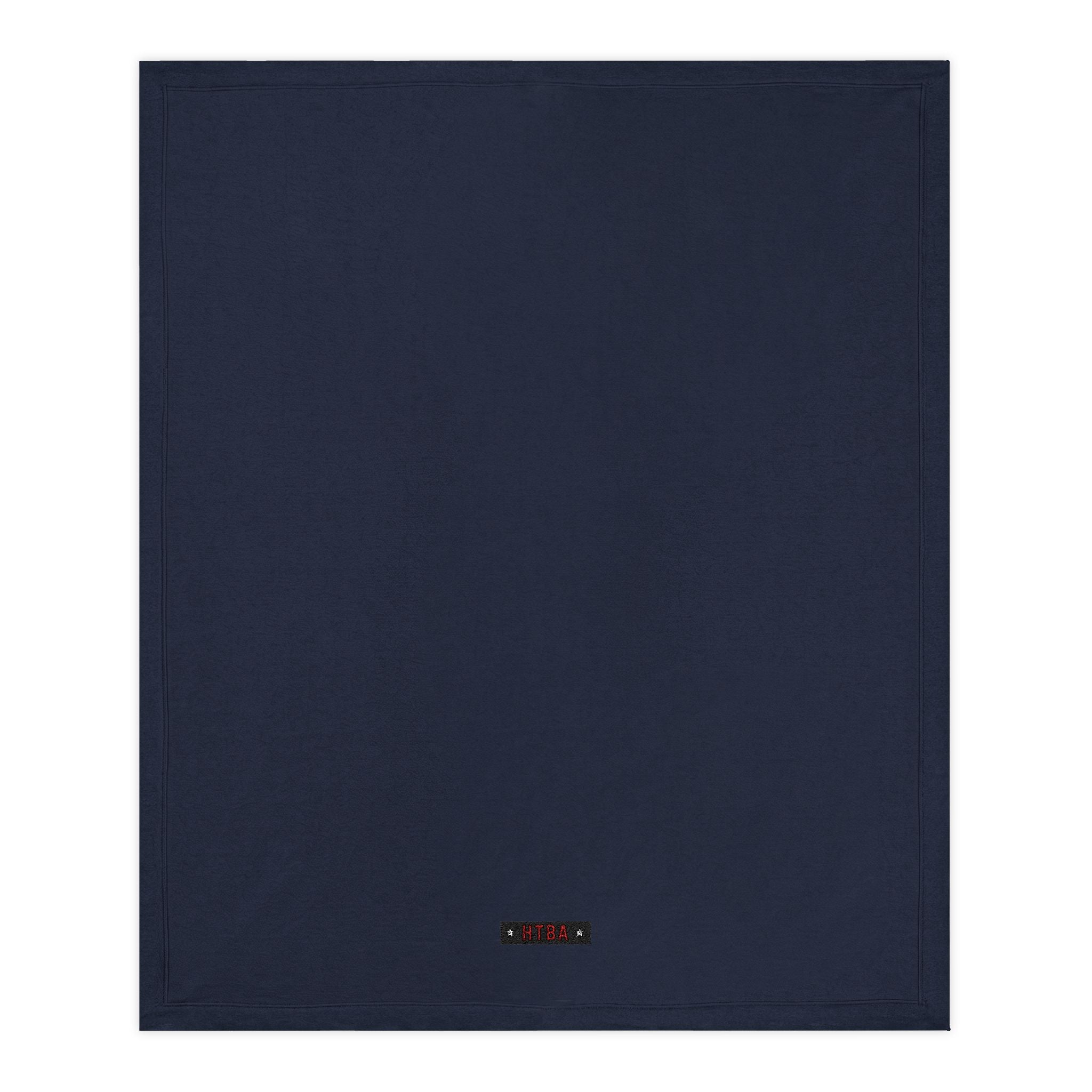 Navy blue Throw Blanket with HTBA brand label on a white background