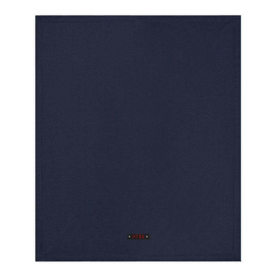 Navy blue Throw Blanket with HTBA brand label on a white background