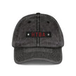Black distressed cap with 'HTBA' logo on a white background