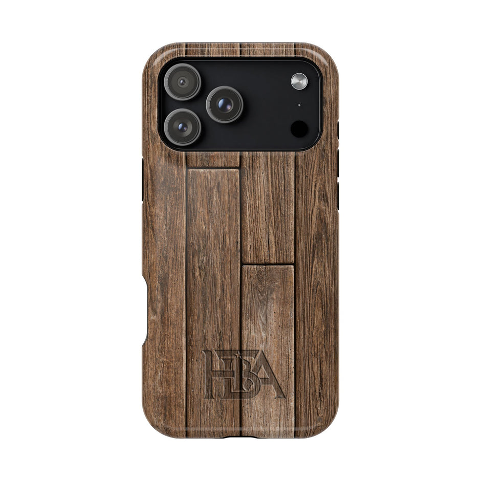 Wooden phone case with 'HTBA' branding on a white background