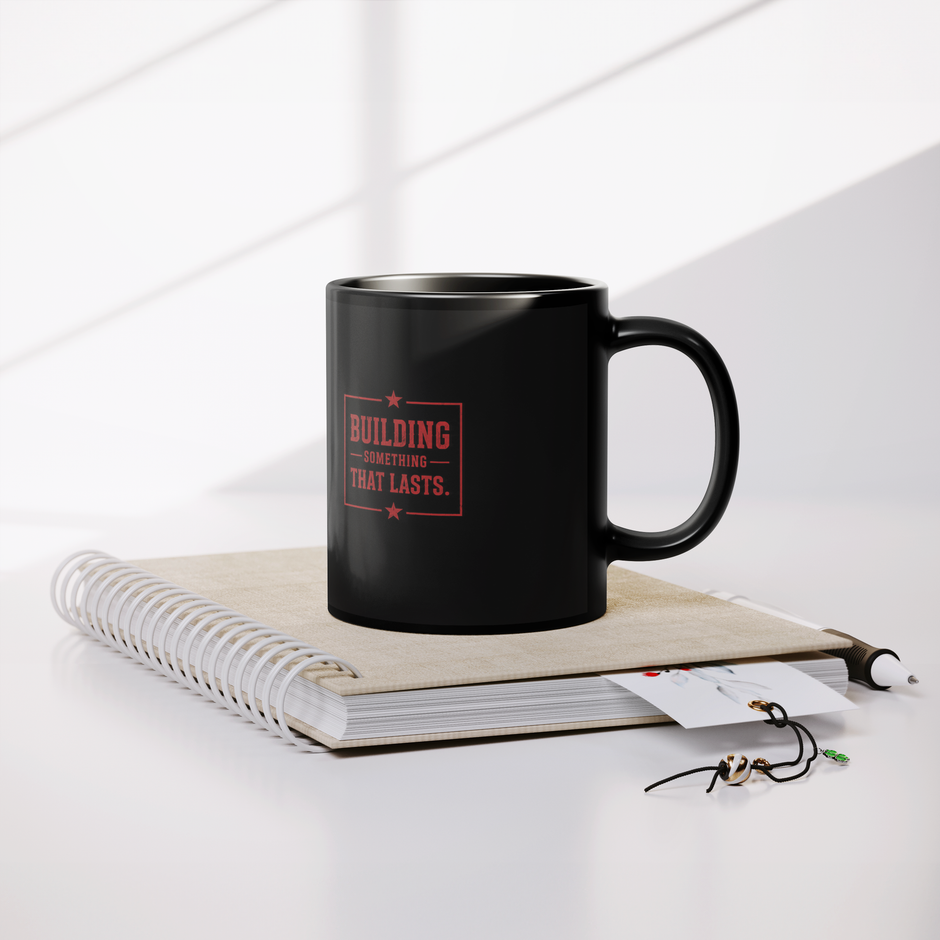 HTBA_Red_on_Black_Mug_Lifestyle_Notebook_Mockup.png_15984606