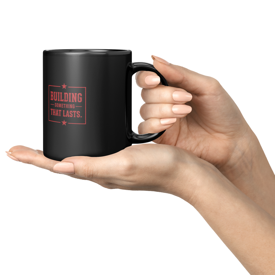 HTBA_Red_on_Black_Mug_Lifestyle_Presentation_Hands_Mockup.png_15984607