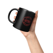 HTBA_Red_on_Black_Mug_Lifestyle_Raised_Hand_LH_Mockup.png_15984608