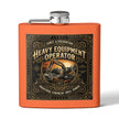 An orange square flask with a silver metal cap and a detailed black and gold graphic label on the front. The label features an excavator illustration and the text 'CONST.