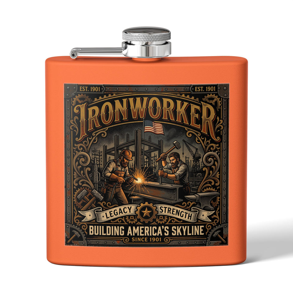 An orange metal flask with a silver screw-top lid and side spout, featuring a large vintage-style 'Ironworker' graphic on the front with an illustration of welders and the text 'Building America's Skyline Since 1901'.