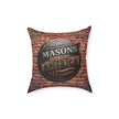 Decorative pillow with 'Masons That Build America' text on a brick wall background