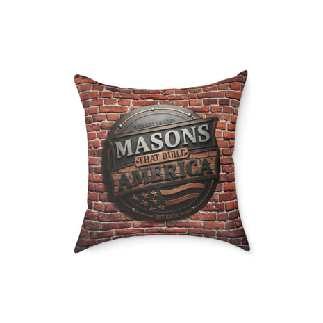 Decorative pillow with 'Masons That Build America' text on a brick wall background