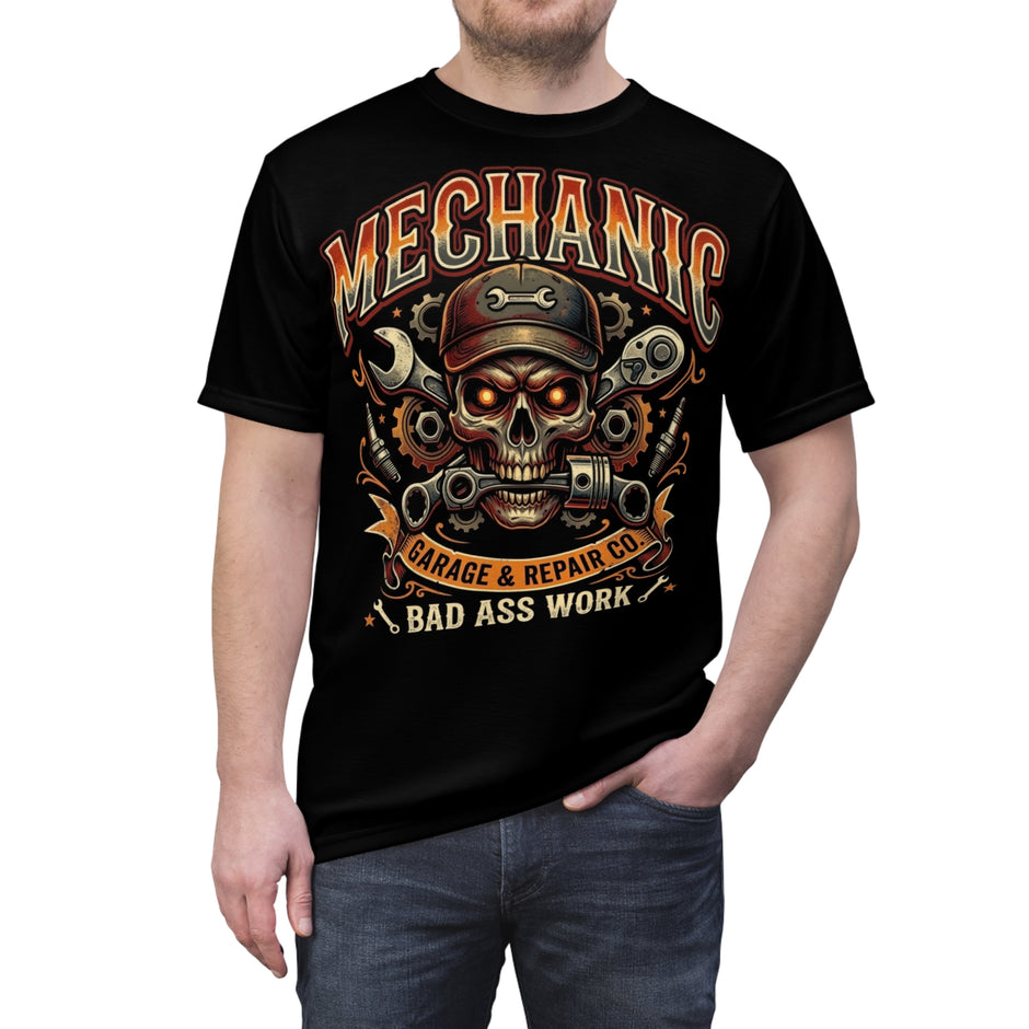 Black t-shirt with a graphic design featuring a skull, wrenches, and text on a white background.