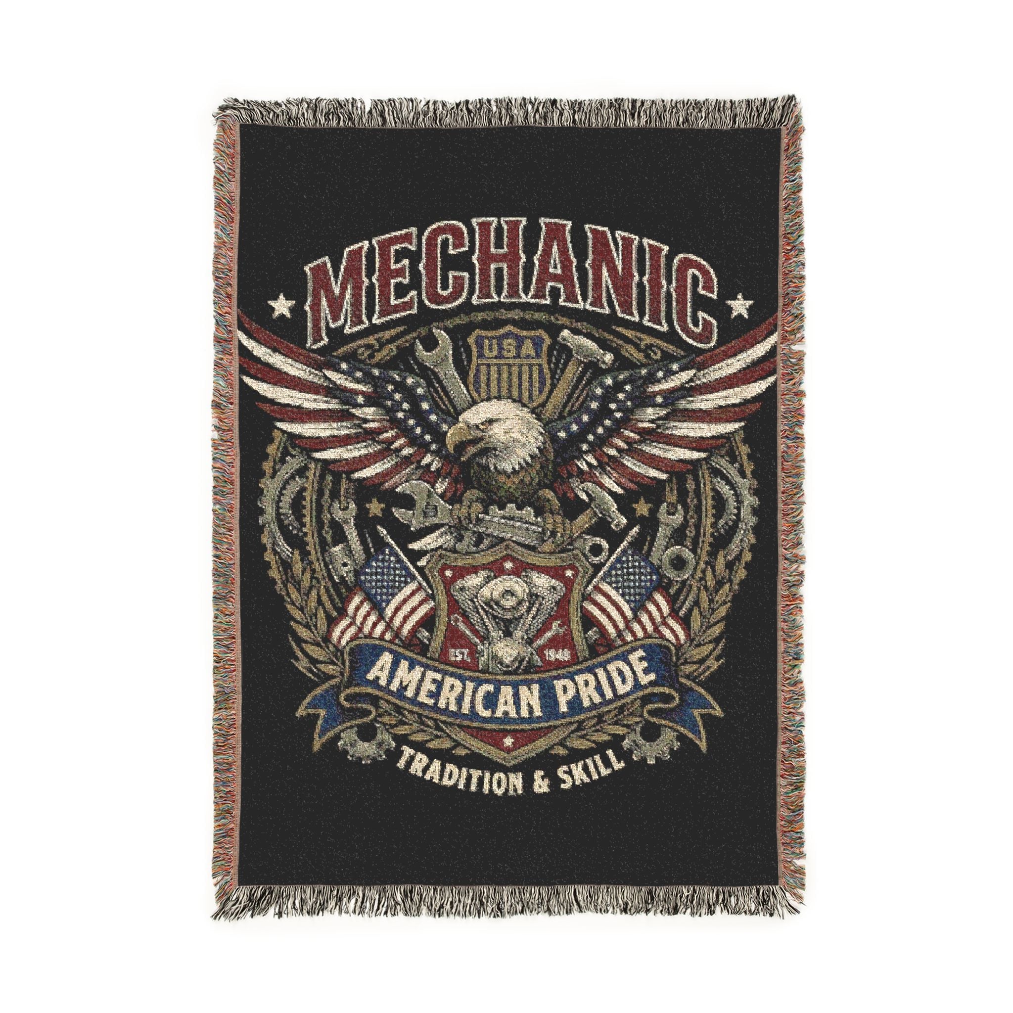 Woven blanket with mechanical design and text on a black background