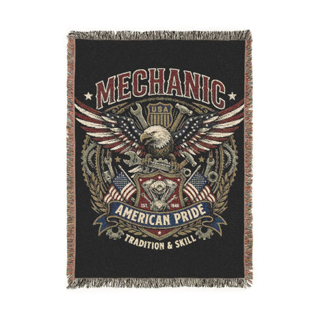 Woven blanket with mechanical design and text on a black background