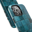 Phone case with blue tile pattern on a white background