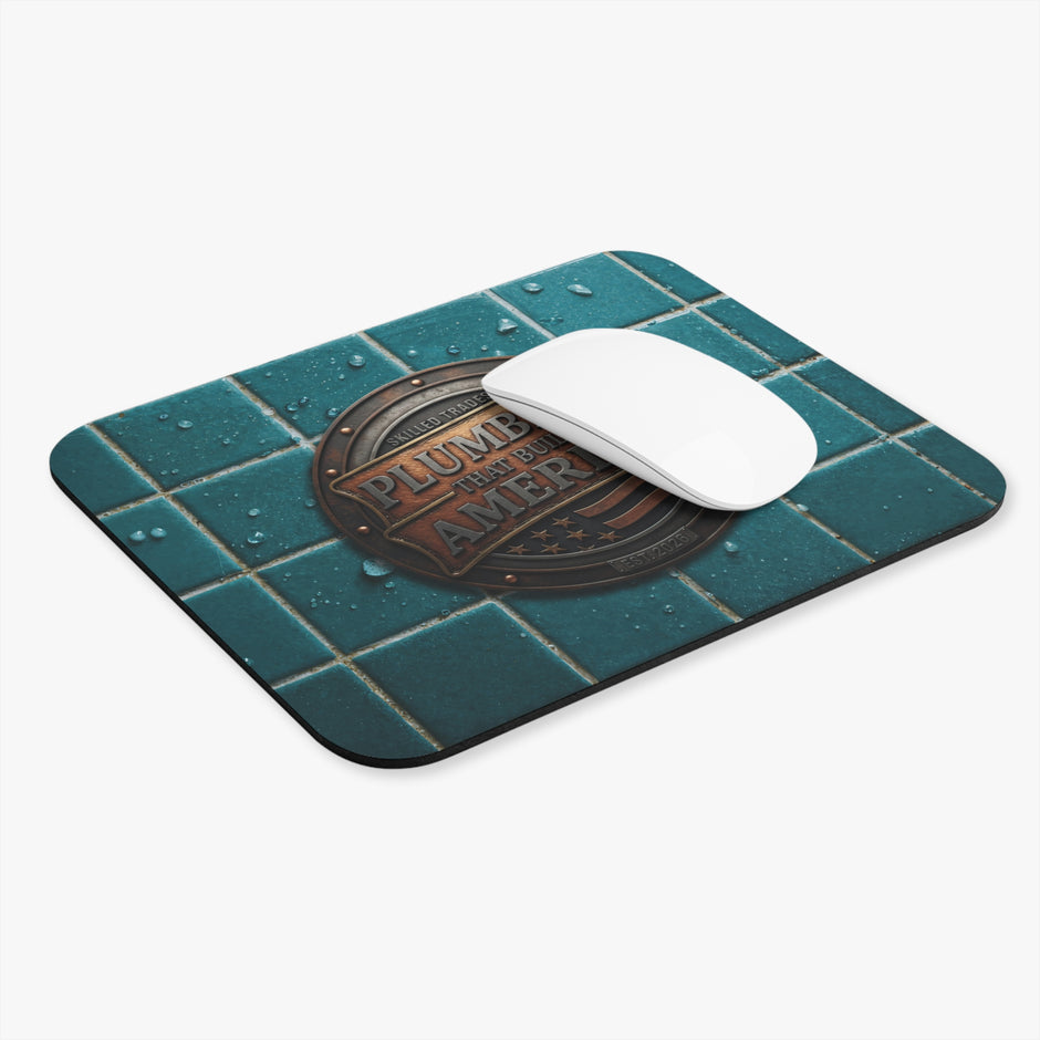 Mouse pad with a vintage-style logo and a white mouse on a teal tiled background
