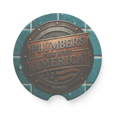 Round Soapstone Car Coaster with 'Plumbers That Build America' text on a blue tiled background