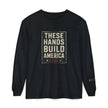 Black long-sleeve shirt with 'These Hands Build America' text on a white background