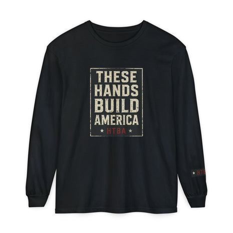 Black long-sleeve shirt with 'These Hands Build America' text on a white background