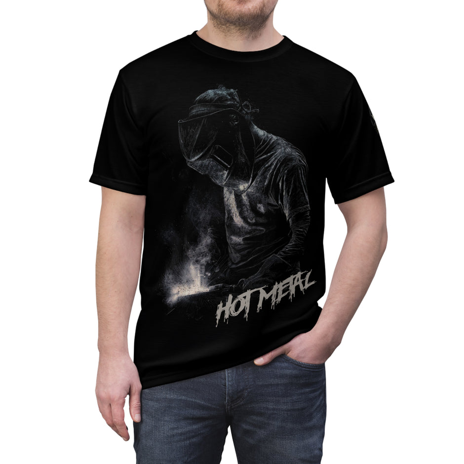 Person wearing a black Welder's t-shirt with a graphic design and 'Hot Metal' text.