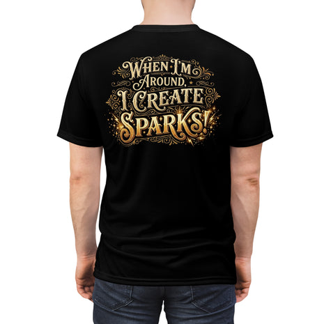 Back side of Black t-shirt with gold text 'When I'm Around, I Create Sparks!' on a white background