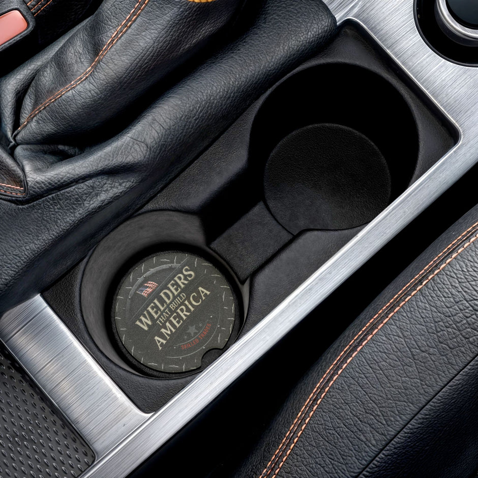 Car cup holder with branded black Welder's coaster