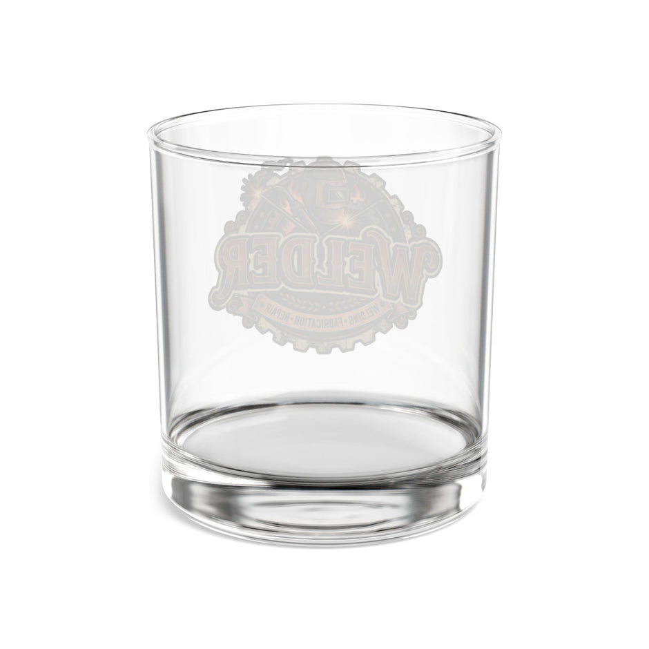 A clear glass rocks tumbler with a frosted gray circular logo on the front, set against a plain white background.